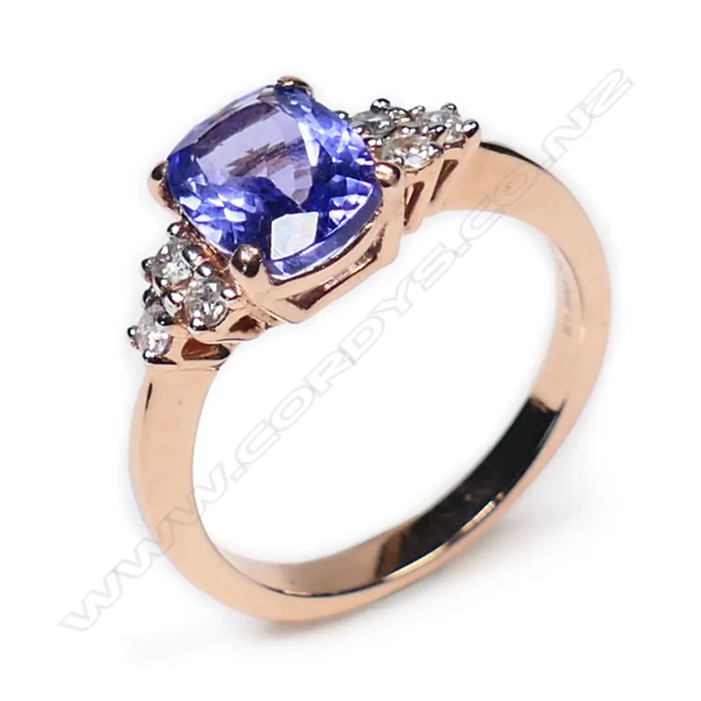 A 14ct rose gold, tanzanite and diamond ring, Image 1++