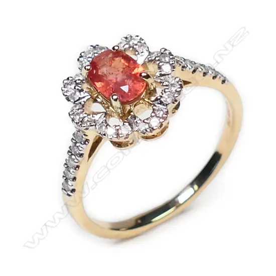 A 14ct gold, orange sapphire and diamond dress ring,