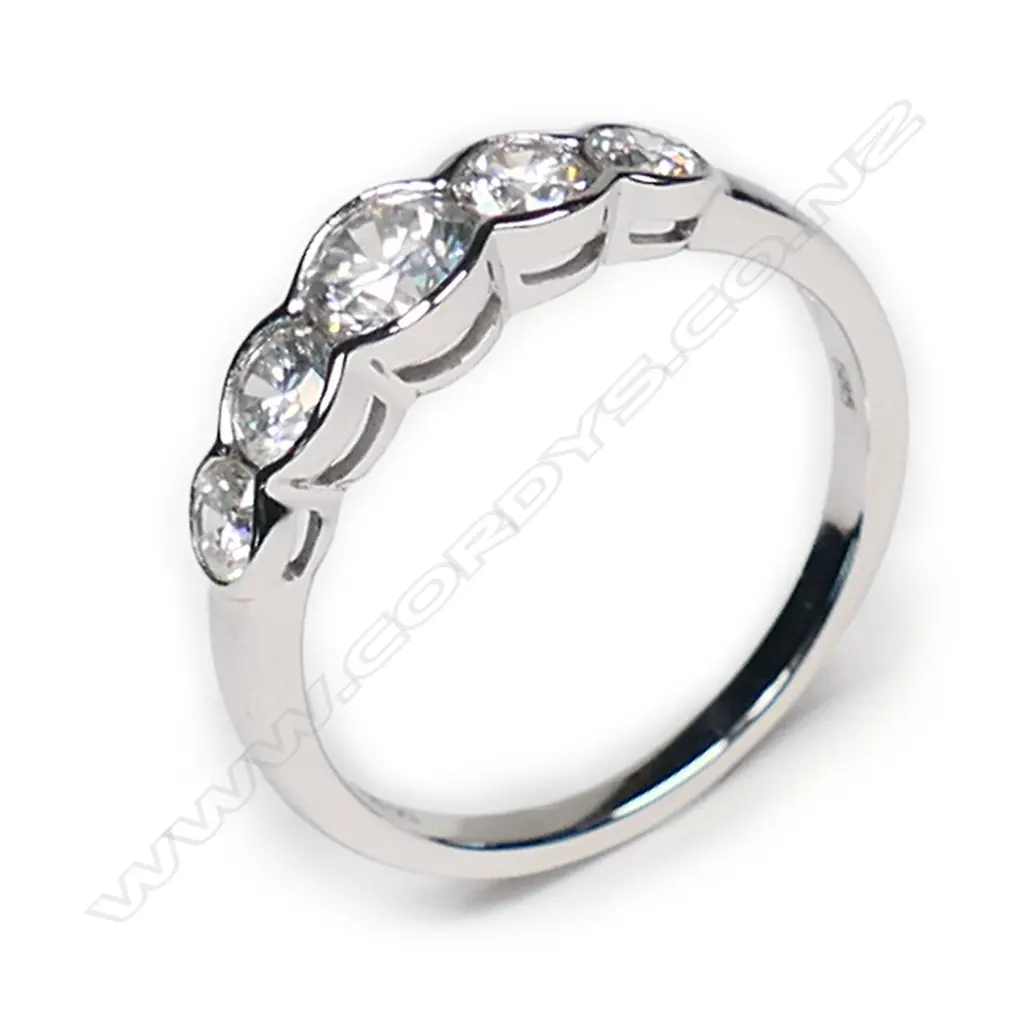 A 14ct white gold and diamond set band, Image 1++
