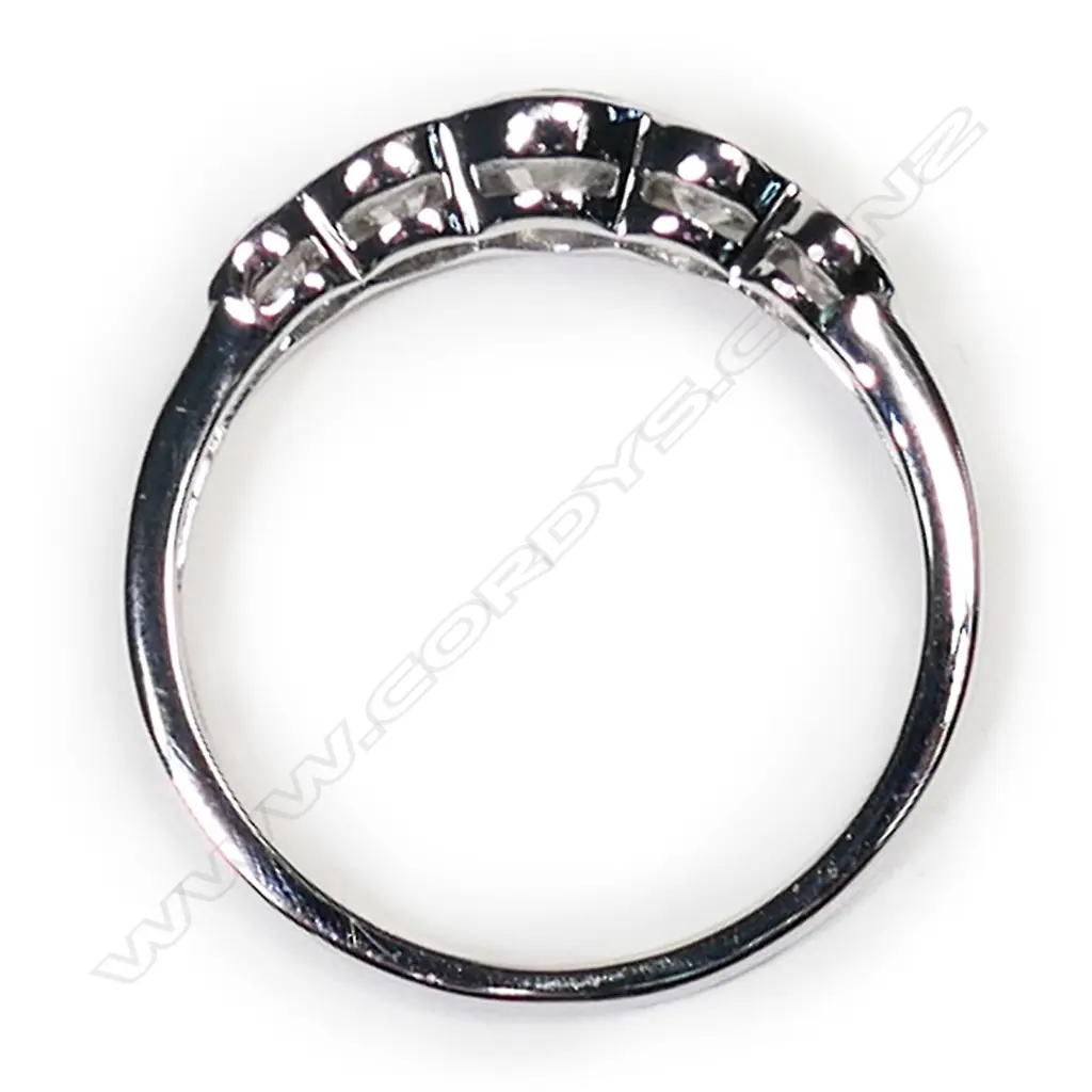 A 14ct white gold and diamond set band, Image 1++