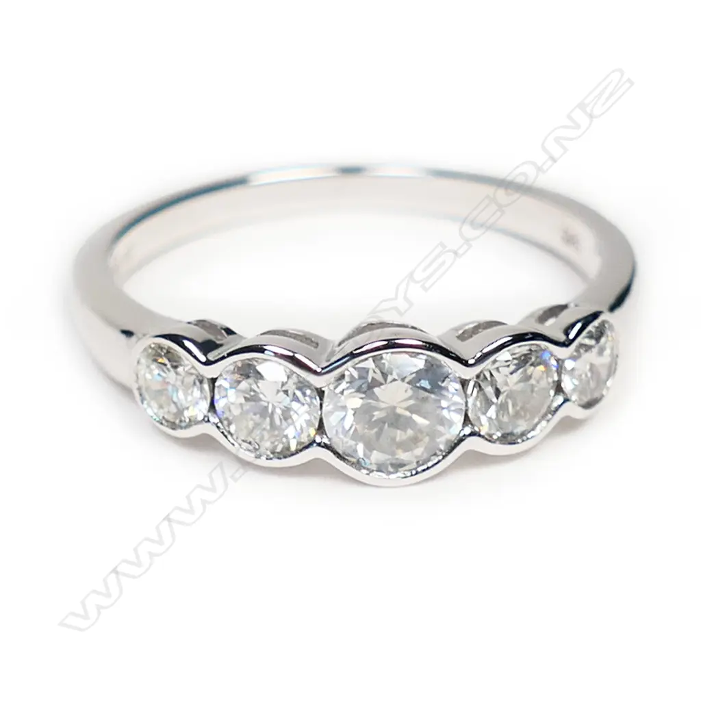 A 14ct white gold and diamond set band, Image 1++