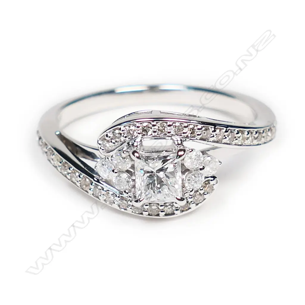 A 14ct white gold and diamond dress ring, Image 1++