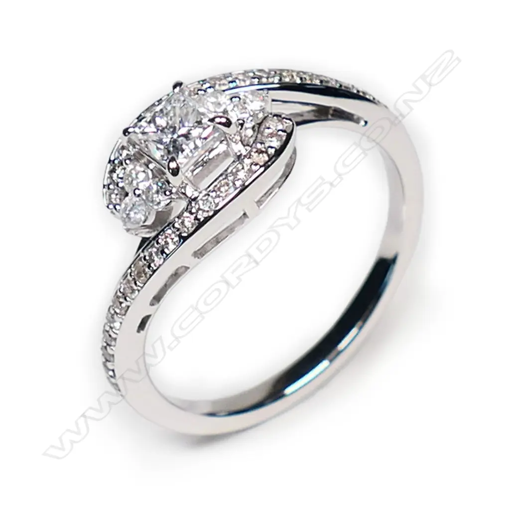 A 14ct white gold and diamond dress ring, Image 1++