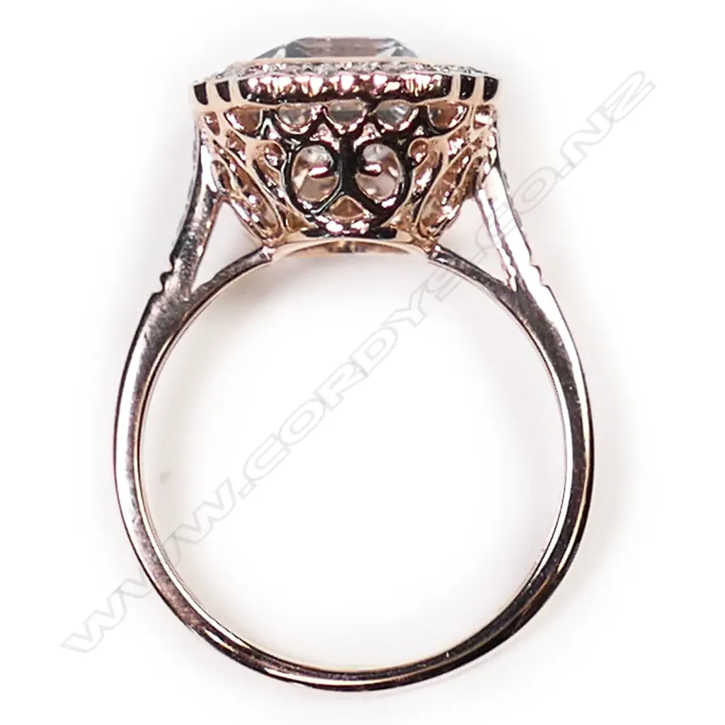 A 14ct white gold, aquamarine and diamond halo ring, Image 1++