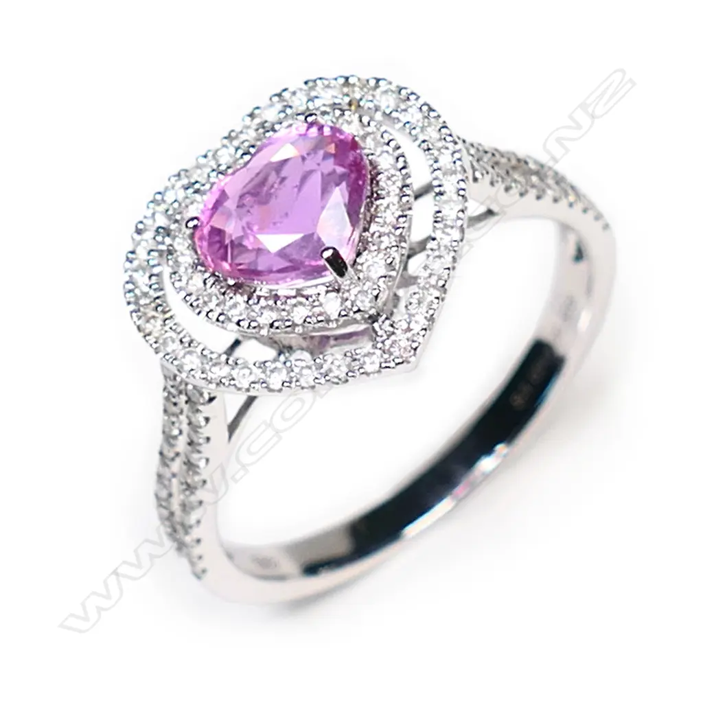 A 14ct white gold, pink sapphire and diamond double halo heart ring, Image 1++