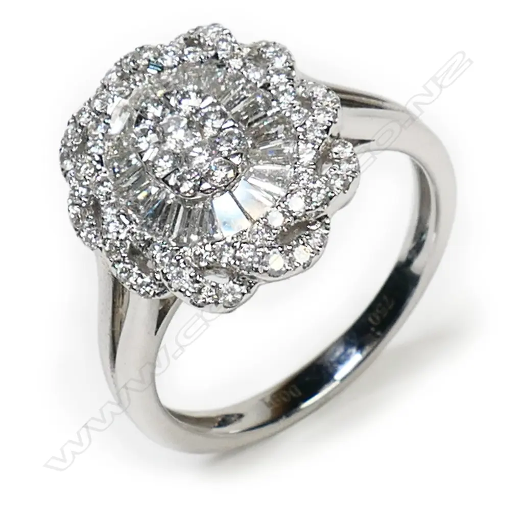 An 18ct white gold and diamond cluster ring, Image 1++