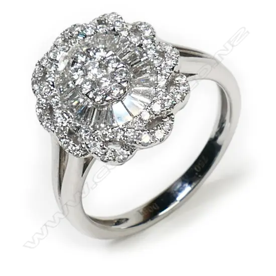 An 18ct white gold and diamond cluster ring,