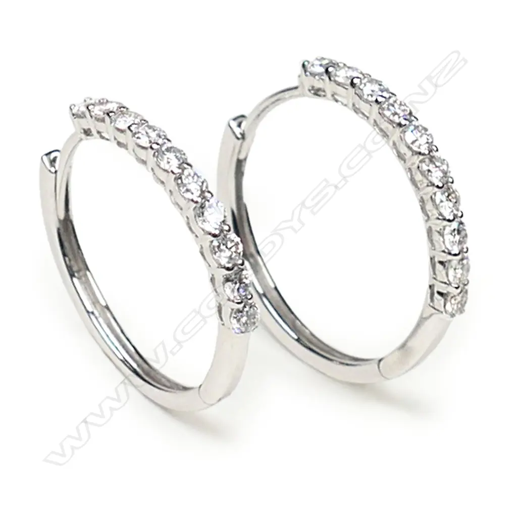 A pair of 14ct white gold and diamond hoop earrings, Image 1++