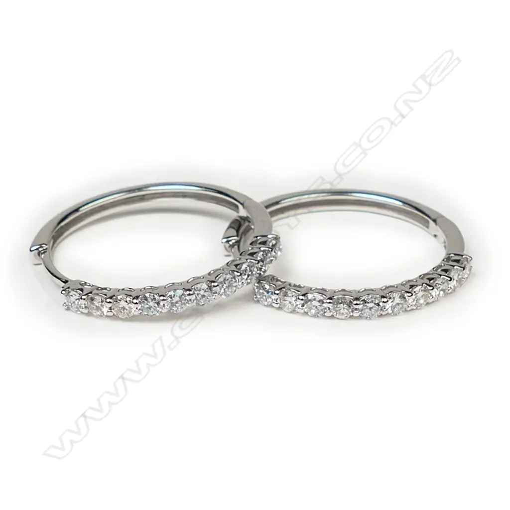 A pair of 14ct white gold and diamond hoop earrings, Image 1++