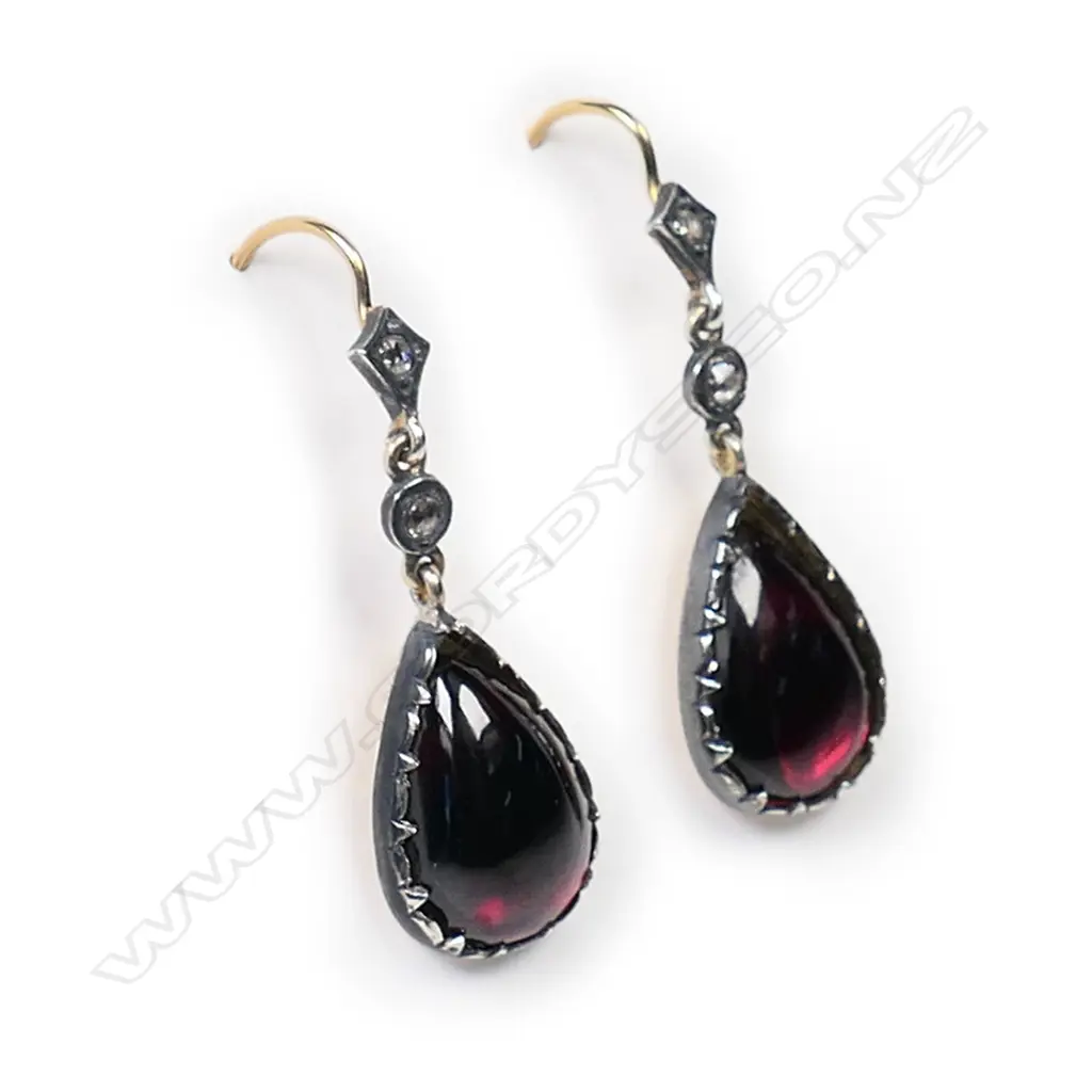 A pair of gold, silver garnet and diamond earrings, Image 1++