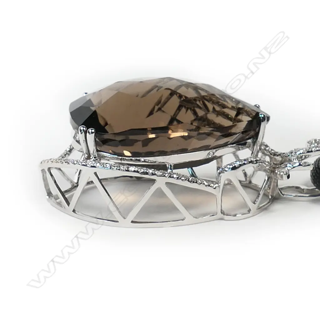 An 18ct white gold and large smoky quartz and diamond set pendant, Image 1++