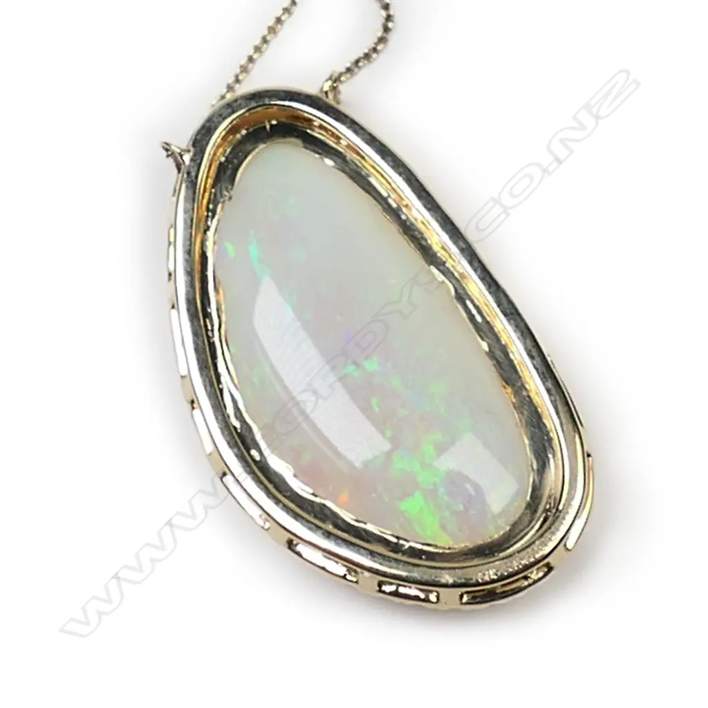 A 14ct gold, opal and diamond necklace, Image 1++
