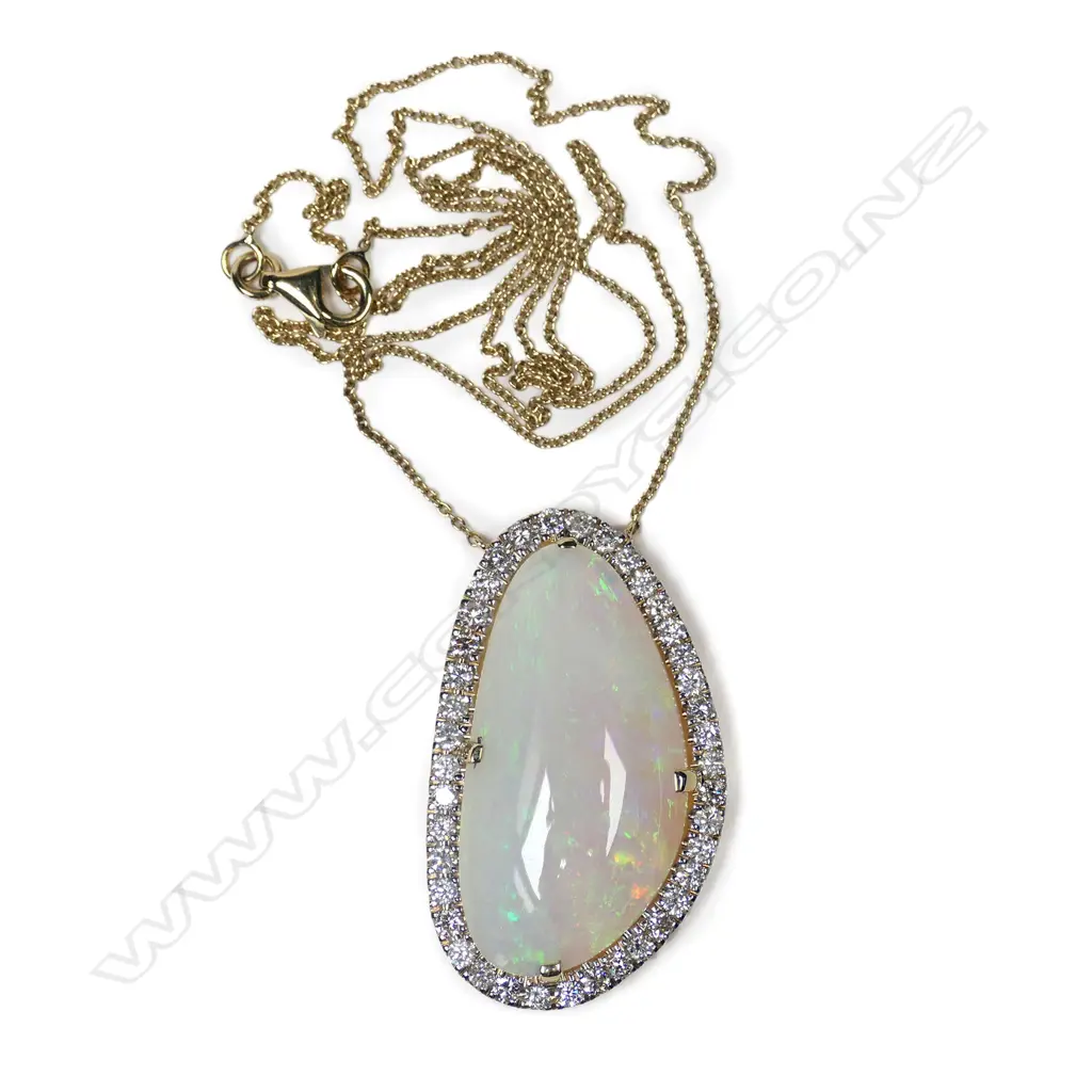 A 14ct gold, opal and diamond necklace, Image 1++