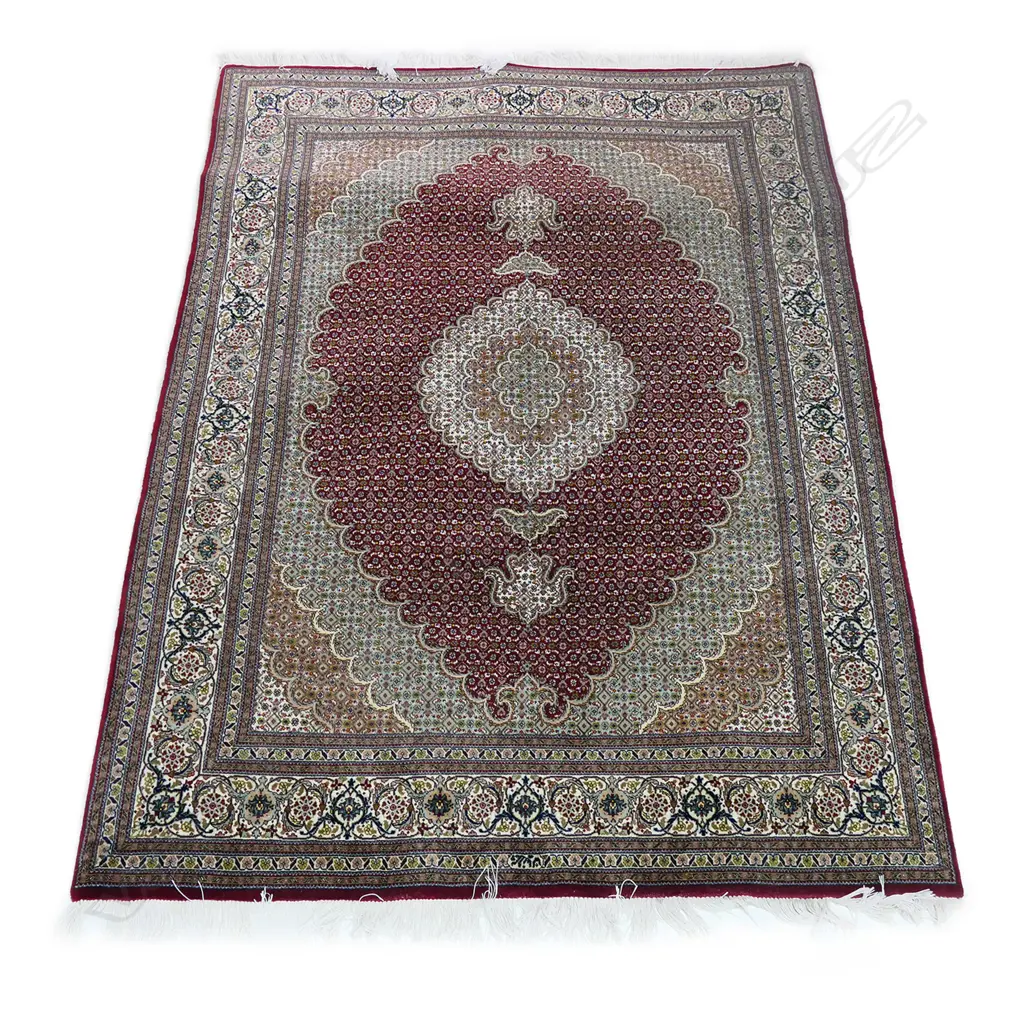 #A fine hand knotted Tabriz rug Image 1++