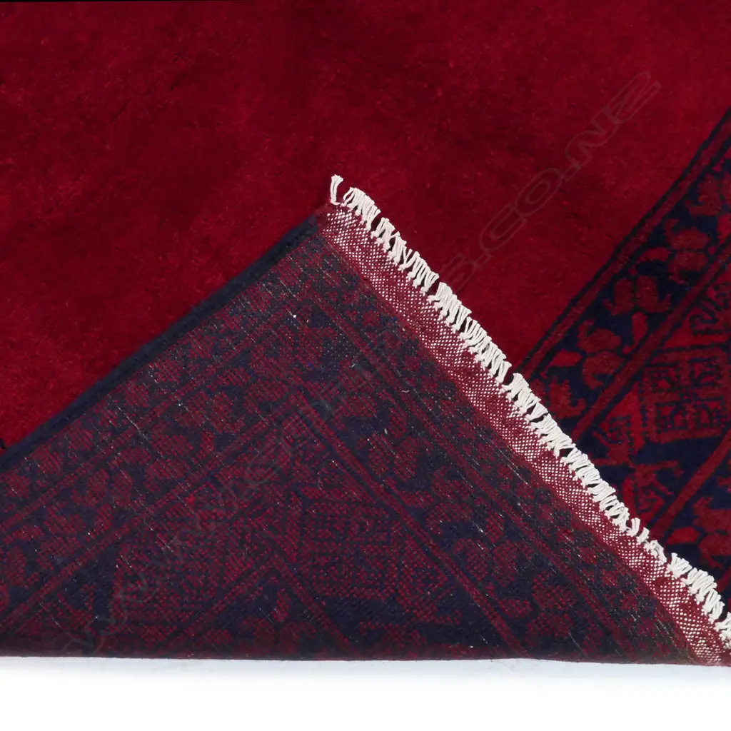 A Turkman rug, decorated with traditional geometric medallions, Image 1++