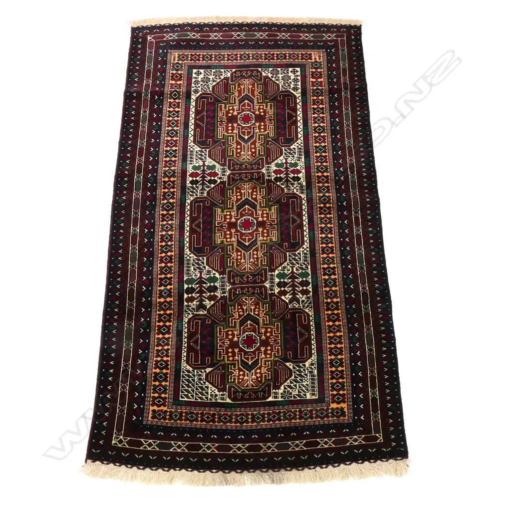 A Balouch hand knotted tribal rug, Image 1++