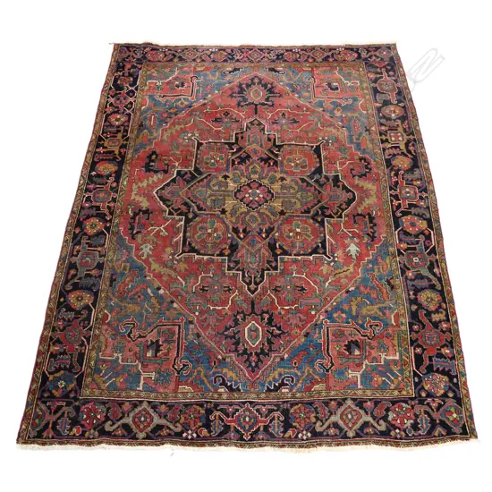 A fine Heriz hand knotted wool carpet,