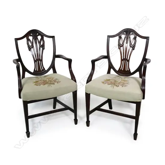 A pair of 19th Century mahogany Sheraton style carver chairs,