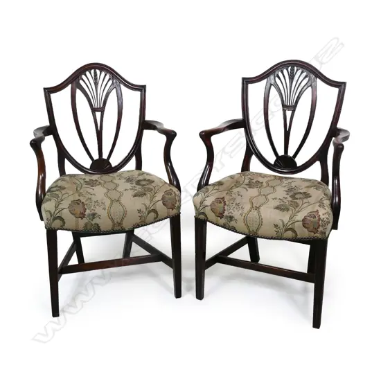 A pair of 19th Century mahogany Hepplewhite style carver chairs,