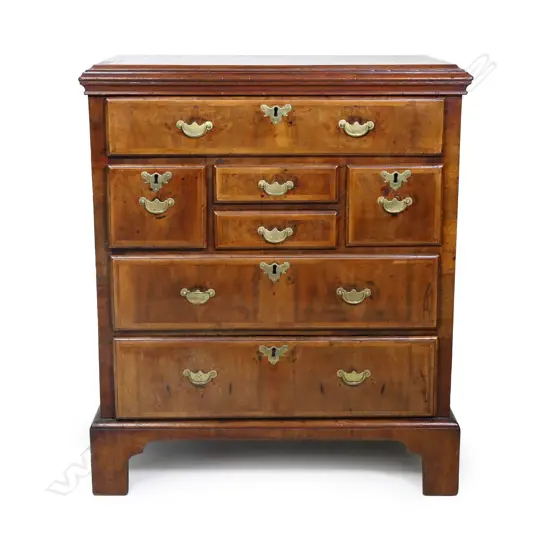 A George I walnut small proportion chest of drawers,