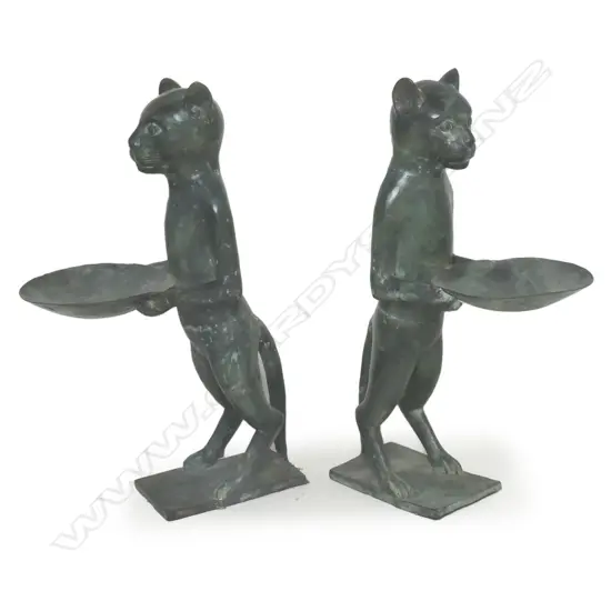 A pair of 20thC bronze standing cat waiters,
