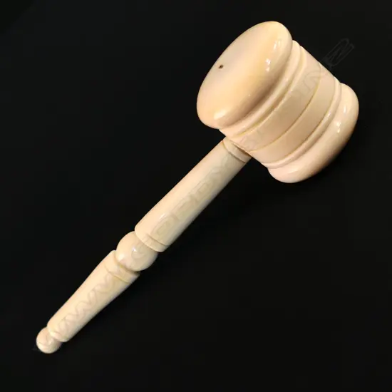 An old turned ivory auctioneers’ gavel,