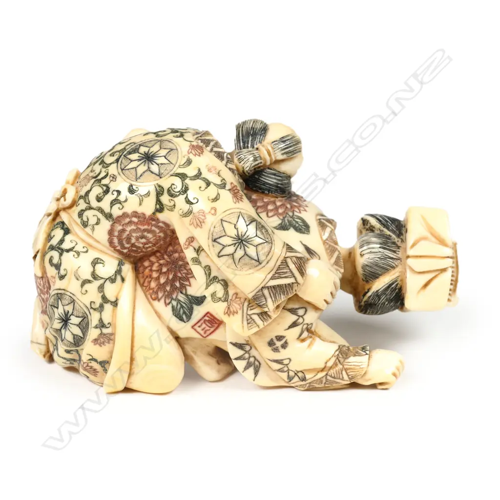 A Japanese carved and stained ivory erotic figure group, Image 1++