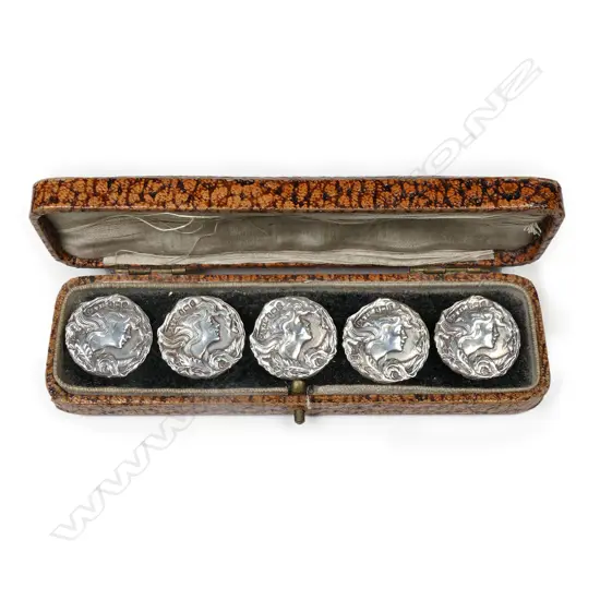 A set of five Art Nouveau silver buttons,