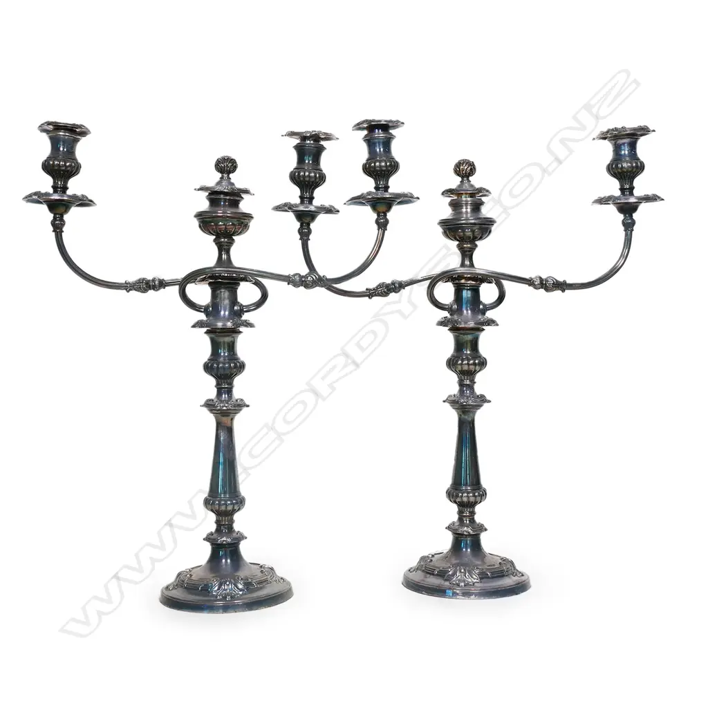 A pair of early 20thC silver on copper table candelabra Image 1++