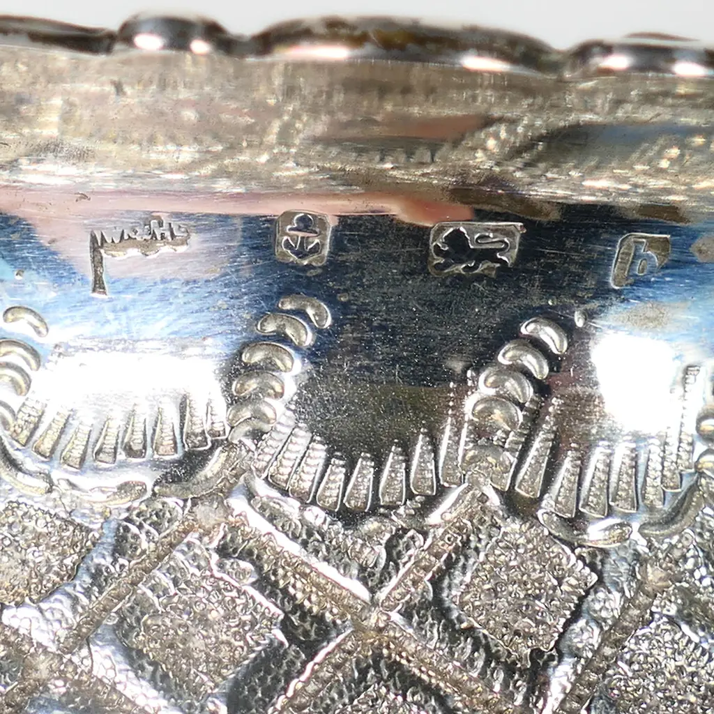 An Edwardian silver bottle coaster, Image 1++