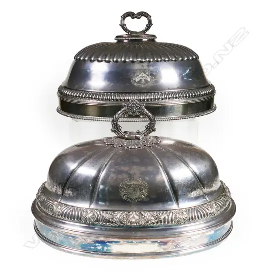 Two small Victorian silver plate food domes,