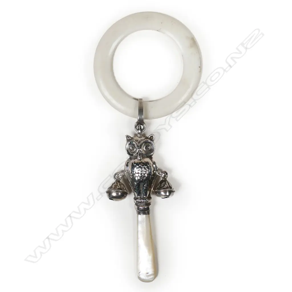 A silver and mother of pearl baby rattle, Image 1++