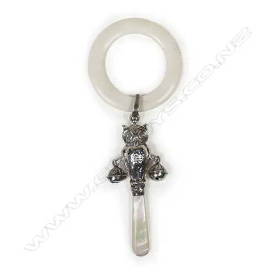 A silver and mother of pearl baby rattle,