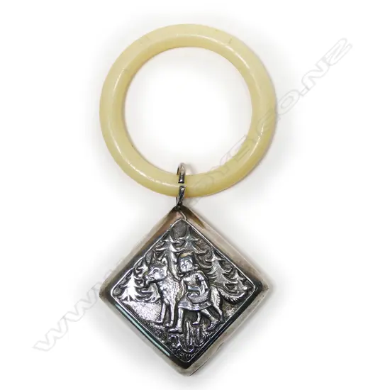A silver baby rattle,