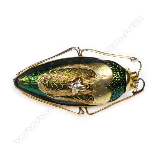 A vintage 14ct gold scarab beetle brooch,