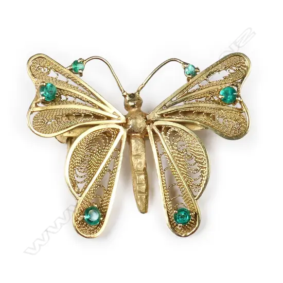 A vintage 18ct gold and emerald butterfly brooch,