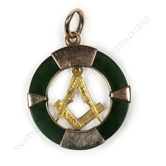 A c.1900  9ct and pounamu circular Masonic fob pendant,