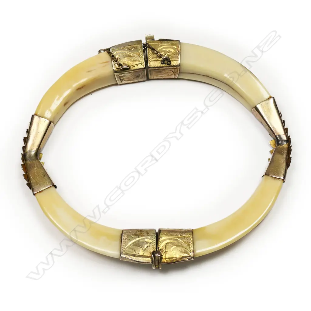 A colonial 9ct gold and boar's tusk hinged bangle, Image 1++