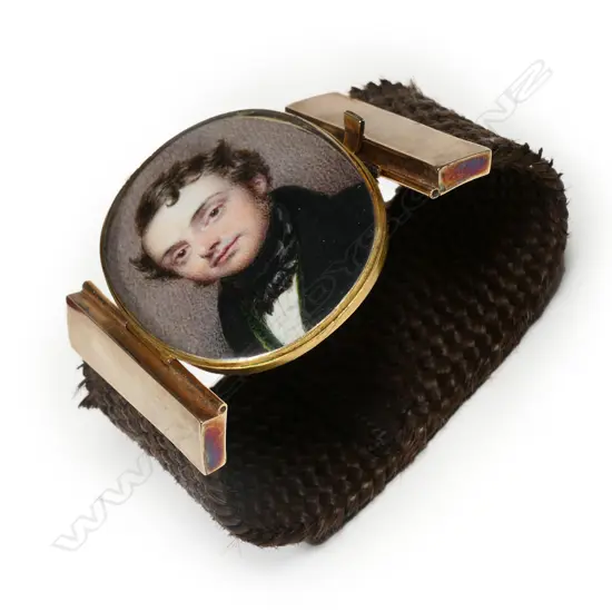 An outstanding Georgian memorial bracelet set with a gold locket portrait miniature