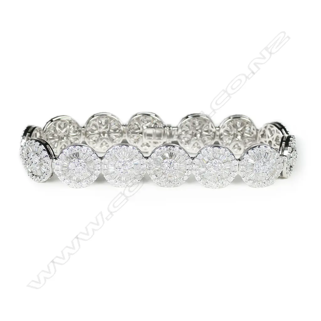 An impressive 18ct. white gold and diamond encrusted multi-link bracelet, Image 1++