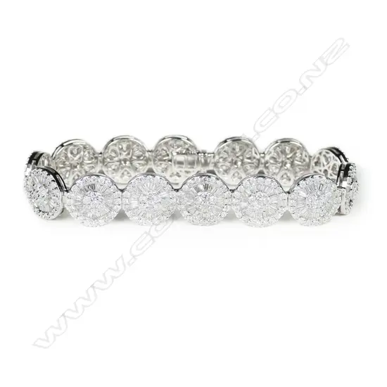 An impressive 18ct. white gold and diamond encrusted multi-link bracelet,