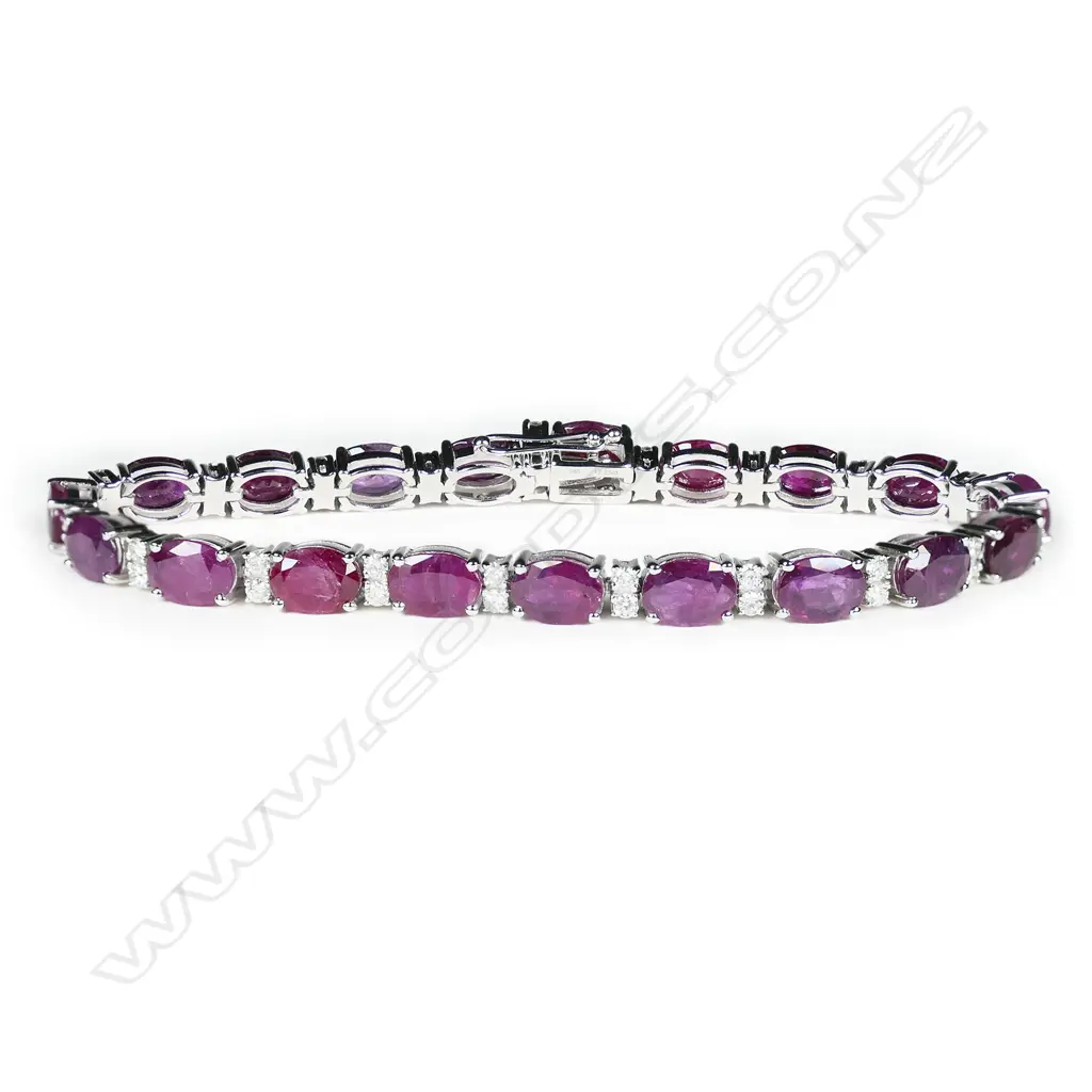 A 14ct white gold, ruby and diamond tennis bracelet, Image 1++