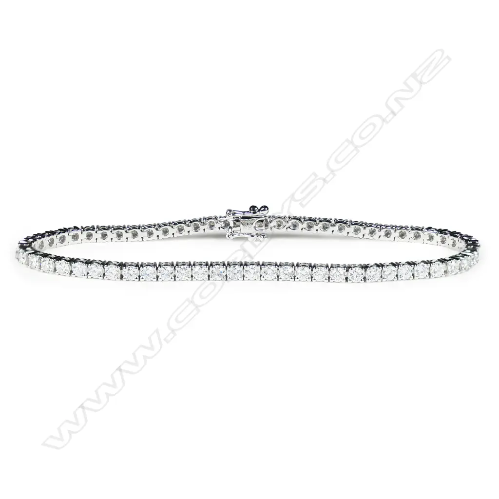 An 18ct white gold and diamond tennis bracelet, Image 1++