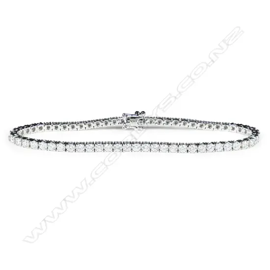 An 18ct white gold and diamond tennis bracelet,