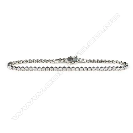 An 18ct white gold and diamond tennis bracelet,