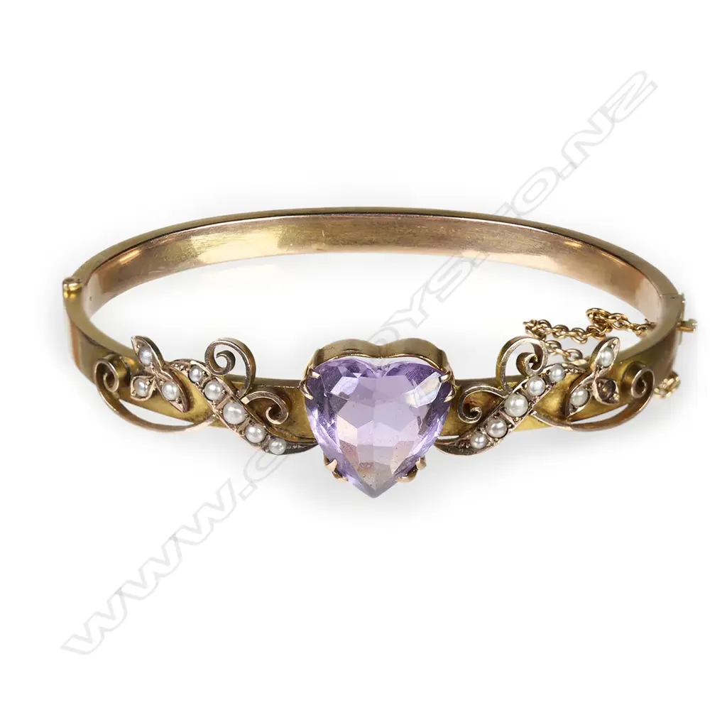 An Edwardian 9ct gilded rose gold snap bangle, Image 1++
