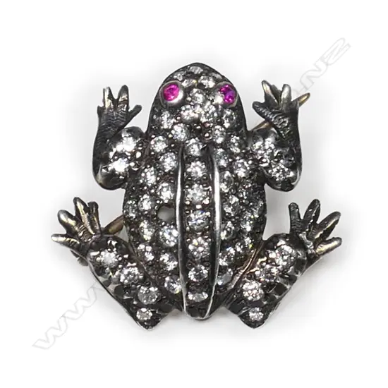 A vintage style gold, silver and diamond frog brooch,