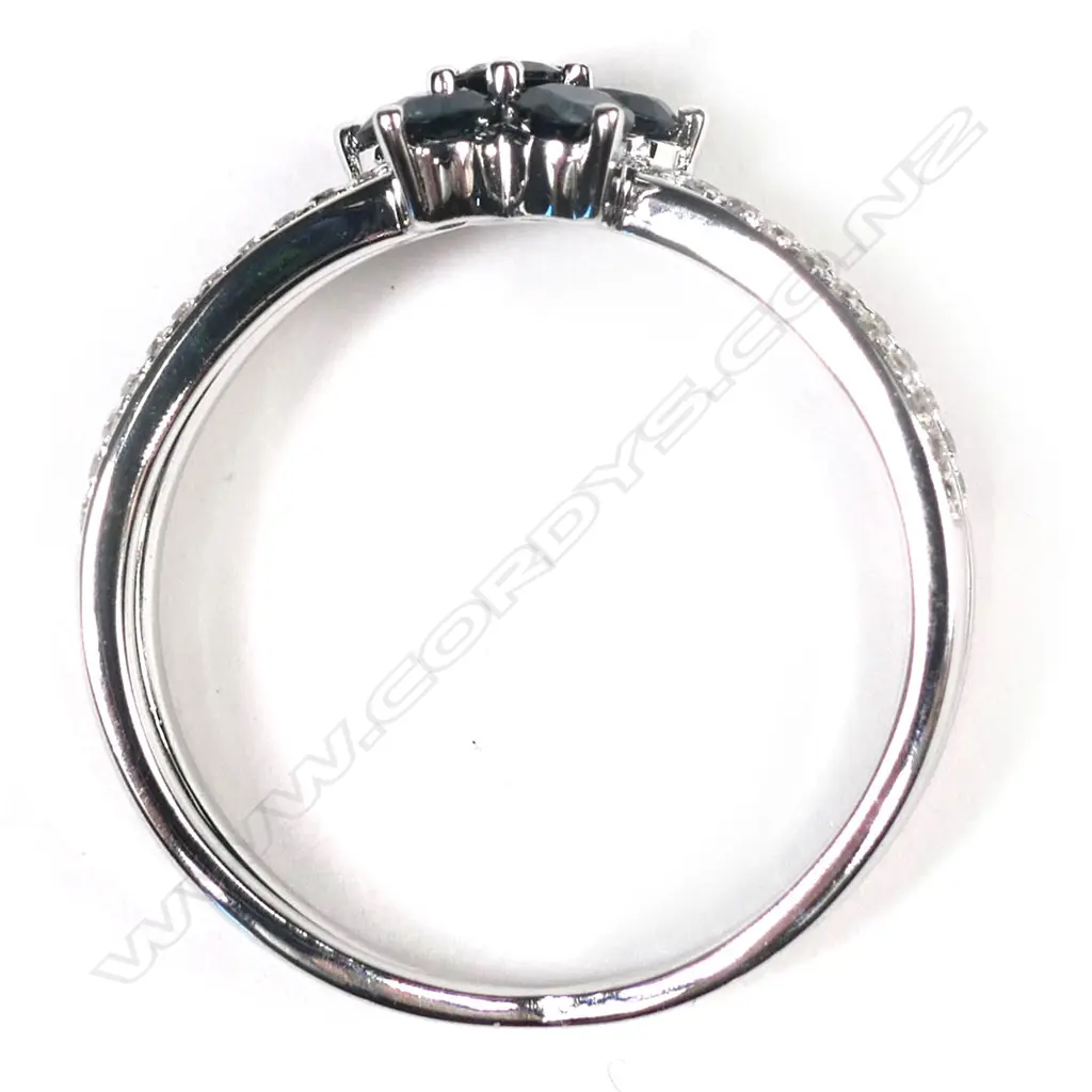 A 14ct white gold, sapphire and diamond flower design ring, Image 1++