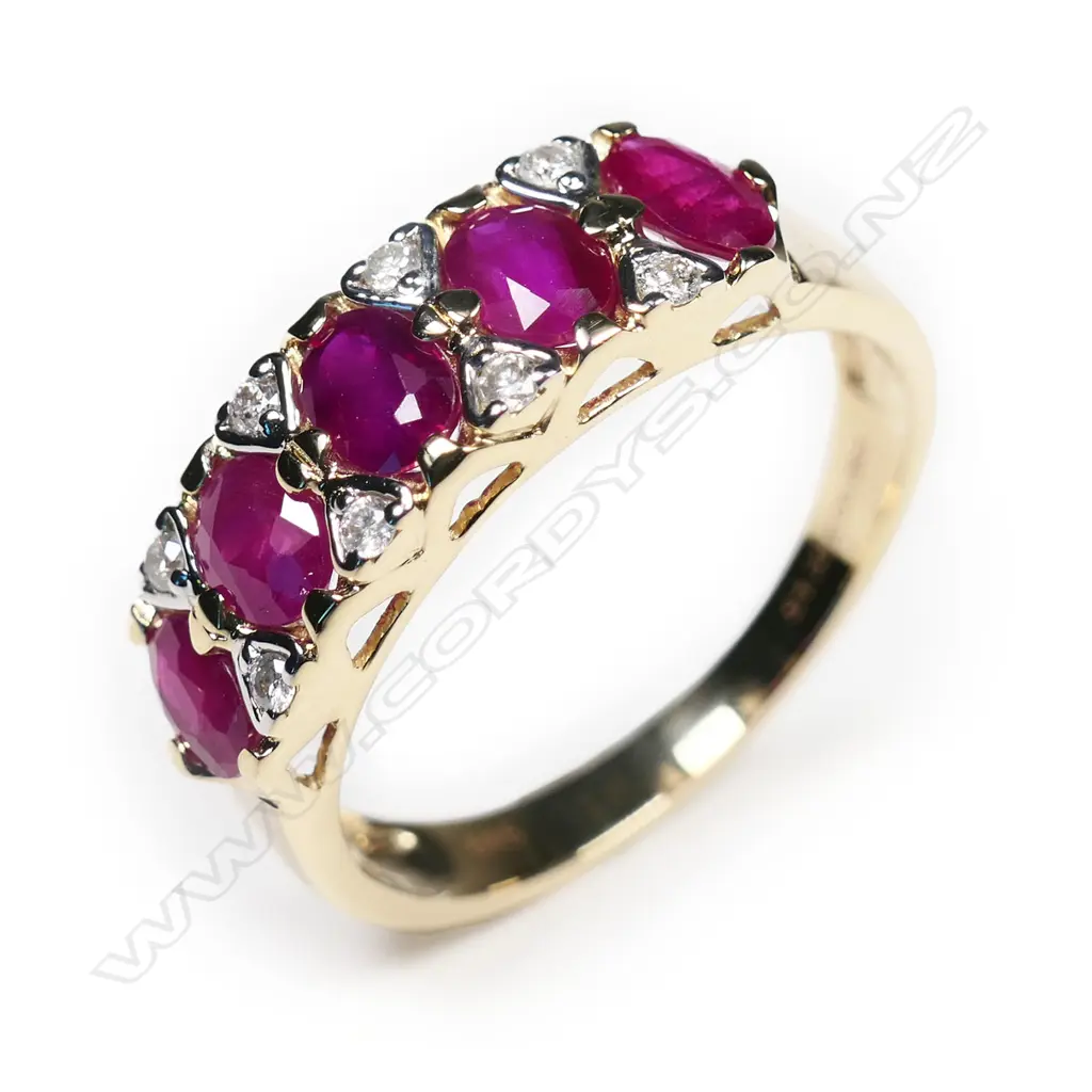 A 14ct gold ruby and diamond set eternity ring, Image 1++