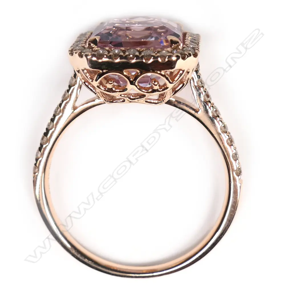 A 14ct rose gold, kunzite and diamond halo ring, Image 1++